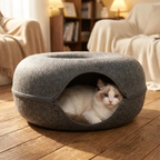 Grey felt cat nest close-up hero with cat curled inside