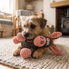 Small dog cuddling the soft donkey toy