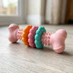 Durable TPR chew bone on the floor