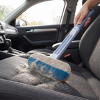 Hair remover brush used on a car seat